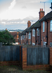 Typical English flat house .Brick building in the town