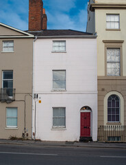 Typical English flat house .Brick building in the town