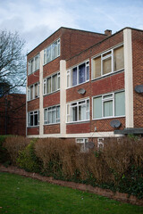 Typical English flat house .Brick building in the town