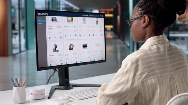 Woman Using Inventory Management Software