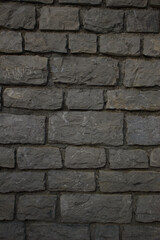 Obraz premium Old grey stone wall texture background, rough masonry architecture surface