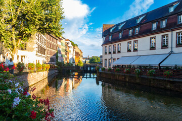 Fototapeta premium Traditional half-timbered houses on the canals district La Petite France in Strasbourg, Alsace, France. UNESCO World Heritage Site