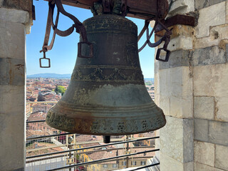 Fototapeta premium Old Pisa tower bell on the top of famous Pisa tower. Tuscany, Italy.