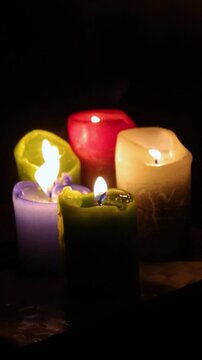 Candles. Burning candle flame. Flickering fire movement. Dark room candlelight. Melting wax video. Cozy night atmosphere. Warm golden glow. Slow dancing light. Cinematic fire mood. Meditative flicker