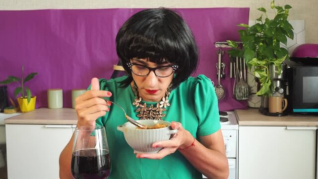 a woman eating chicken soup