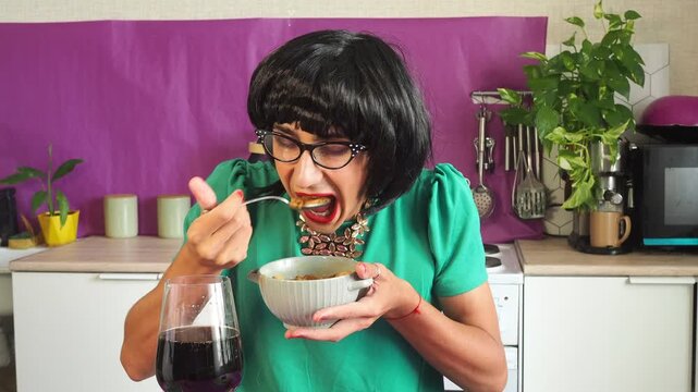 a woman eating chicken soup