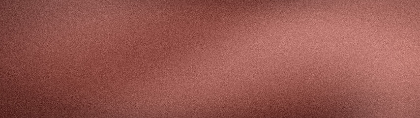 Fototapeta premium Wide abstract background featuring a soft grainy texture with warm earthy transitions of terracotta, beige, and sand hues, perfect for minimal banner templates