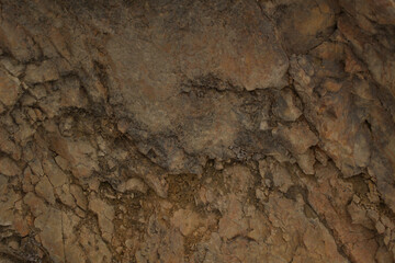 Fototapeta premium Natural rough rock texture background, weathered stone surface details