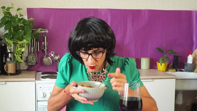 a woman eating chicken soup