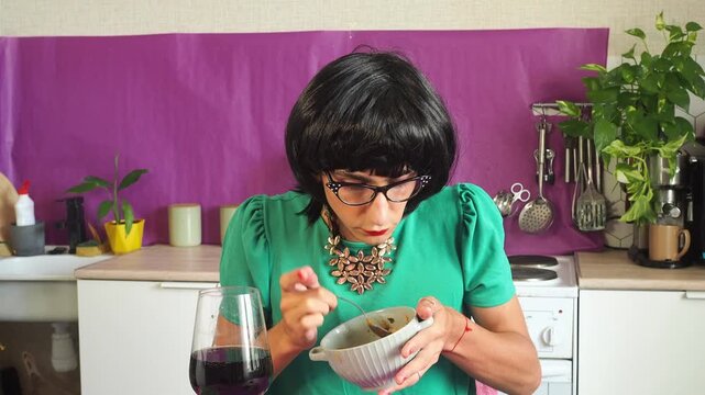a woman eating chicken soup
