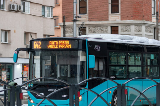 Morning commute with public transport STB vehicle on snowy roads in Bucharest Romania