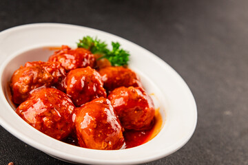 Meatballs tomato sauce meat dish beef, pork, or chicken and turkey meat main course cooking tasty snack fresh delicious gourmet food background on the table rustic food top view copy space