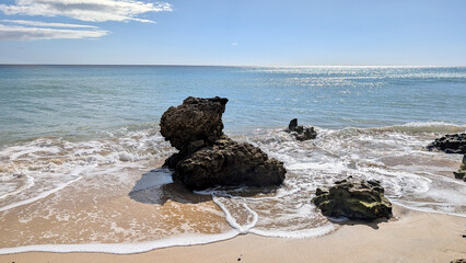 Rocky coast with blue waters of the Atlantic Ocean, Fuerteventura, Canary Islands, Spain.  © Inha