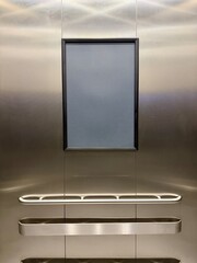 Empty display frame sign holder for a poster in an elevator © clsdesign