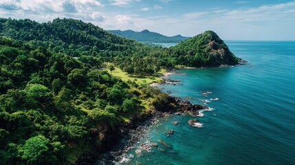 Breathtaking Aerial View of Tropical Coastline and Lush Green Forest