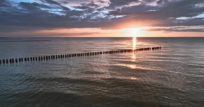 Stunning Baltic Sea and the sunset in summer in Poland.