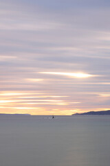 Obraz premium sunset on the beach. Seaside town of Turgutreis and spectacular sunsets. Selective Focus. Long Exposure shoot. tranquility scene.