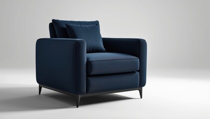 Fototapeta premium Sapphire-colored armchair in dark blue. Contemporary designer piece against a white backdrop. Fabric chair