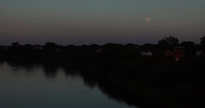 Villahermosa, Tabasco, Mexico - January 2, 2026: A full moon rises over the Gaviotas neighborhood.