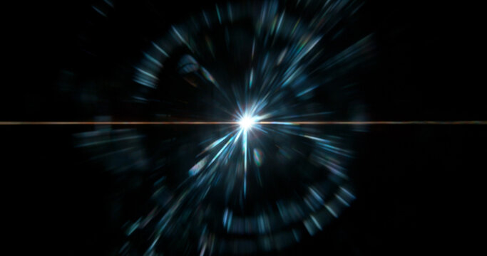 Abstract cinematic lens flare with bright light burst and star rays, isolated on black background. Optical light effect ideal for VFX overlays, transitions, titles and dramatic visual accents.