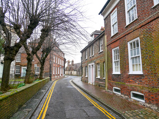 Historic Georgian town houses on Church Street in Poole, Dorset, England on a rainy day