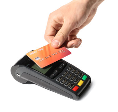 Man with credit card using payment terminal on white background, closeup