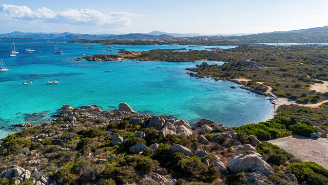 Aerial view of Capocchia d'u purpu beach (Testa del Polpo) and its iconic granite rock on Giardinelli island in La Maddalena archipelago, Sardinia, Italy