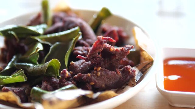 Thai Sun Dried Beef Deep Fried with Chili and Kaffir Lime Leaves