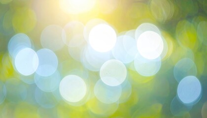 Obraz premium Soft, out-of-focus circles of light and green hues create a dreamy, ethereal atmosphere