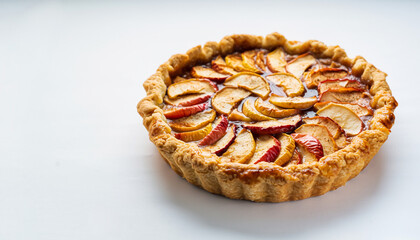 Freshly baked apple tart suitable for bakery menus, food blogs, recipe cards, dessert recipe books, and culinary social media posts.
