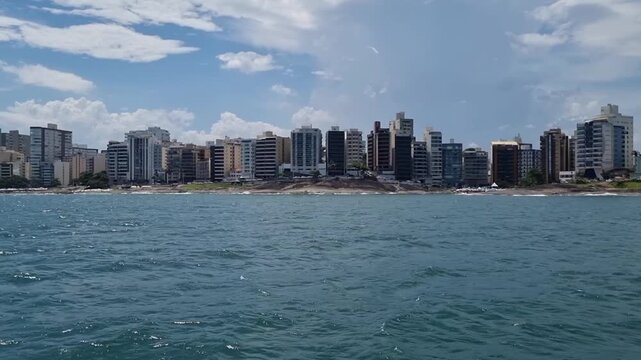 Praia das Virtudes Urban Coastline with City Skyline Filmed from Boat in Esp&iacute;rito Santo