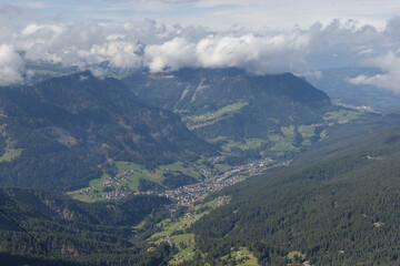 Obraz premium foggy hazy mountain view in italian dolomites (seceda italy south tirol) travel tourism hiking destination famous landmark mountains mountain trail