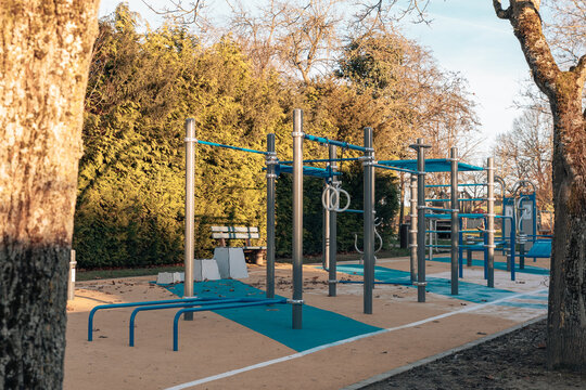 View of the workout area with outdoor equipment.