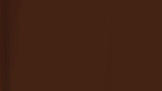 ピンク色の背景に上から溶けたチョコレートが流れ落ちてくるアニメーション動画