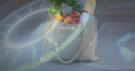Naklejka premium Showing beige canvas tote holding greens, baguette, fruit, carton on gray table, HUD overlays