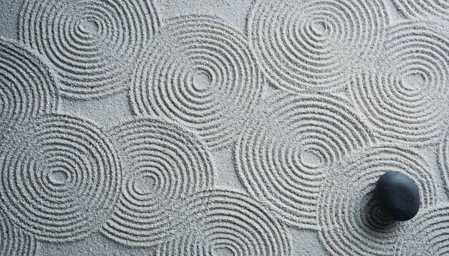 Top Down Minimalist Japanese Zen Garden Raked Gravel Texture with Single Stone