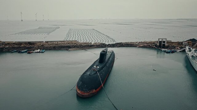 Abandoned Class Kilo Submarine next to the sea