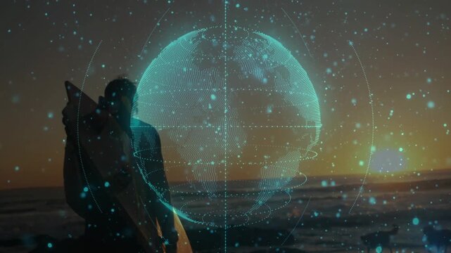 Surfer carrying surfboard walking toward ocean to surf as digital globe appearing, pulsing center