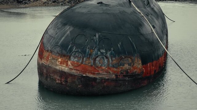 Abandoned Class Kilo Submarine next to the sea