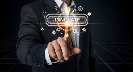 Businessman innovating with glowing button and futuristic icons