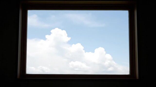 Clouds Viewed Through Rectangular Window Frame.