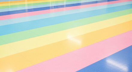 Colorful horizontal stripes on a reflective surface with light reflections colorful stripes