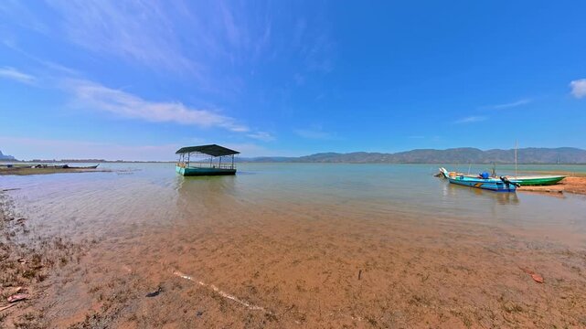 Floating platform and boats on Timah Tasoh Lake in Perlis Malaysia