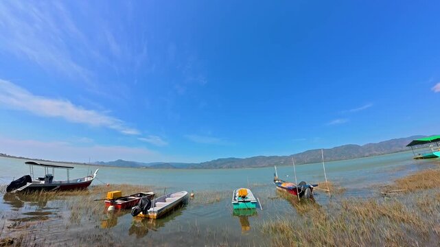 Beautiful panoramic view of boats on Timah Tasoh Lake in Perlis Malaysia