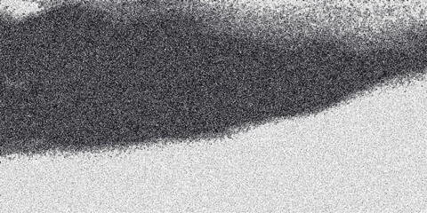 Abstract monochromatic textured background with a gradient of granular noise and a dark organic cloud formation against a light speckled surface for creative design