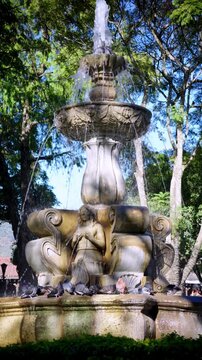 Vertical View Of Fountain of the Sirens In The Central Park Of Antigua, Guatemala. Close-up Shot