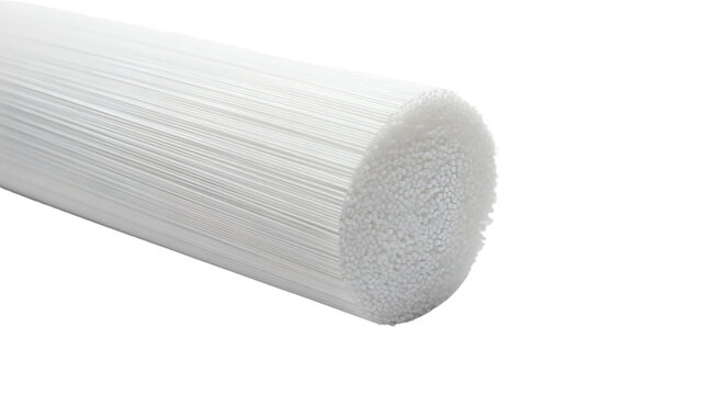 Close-up of a bundle of fine, white, parallel strands, forming a cylindrical shape with a textured end. Isolated on black