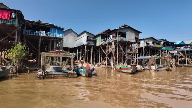 Cruising past the floating village of Kampong Phluk near Siem Reap in Cambodia.