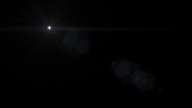 Starburst light radiates outward from center against black background