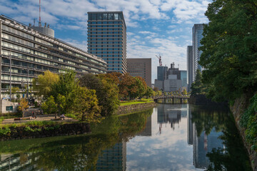 The Hirakawa moat at the walls of the Imperial Palace East National Gardens near the Takebashi Subway Station in the Chiyoda City on a sunny autumn day, Tokyo, Japan